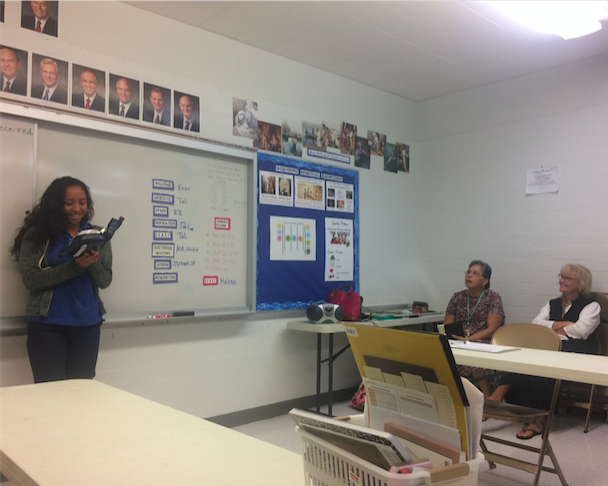 Junior Taliloa Fano stands in front of her class to read and expound on a scripture.
