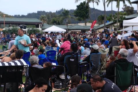 Thousands of people gather on the lawn for the entertainment at Ho‘olaule‘a