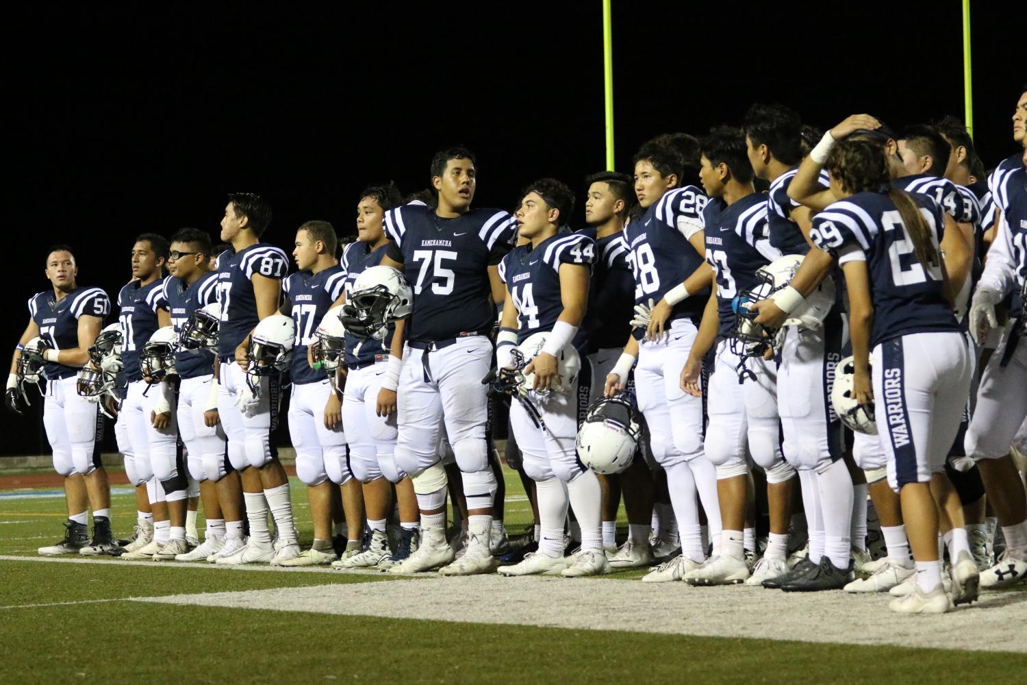 Kamehameha Varsity Football Team join together to sing Sons of Hawai‘i.