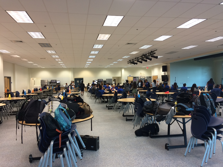 Kalama Dinning Hall, where middle school students are seated at assigned tables to eat school lunch. 