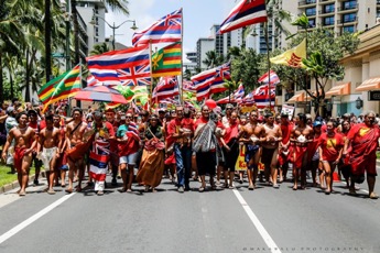 Thousands march down the streets of Waikiki, exhibiting Native Hawaiian pride and support.