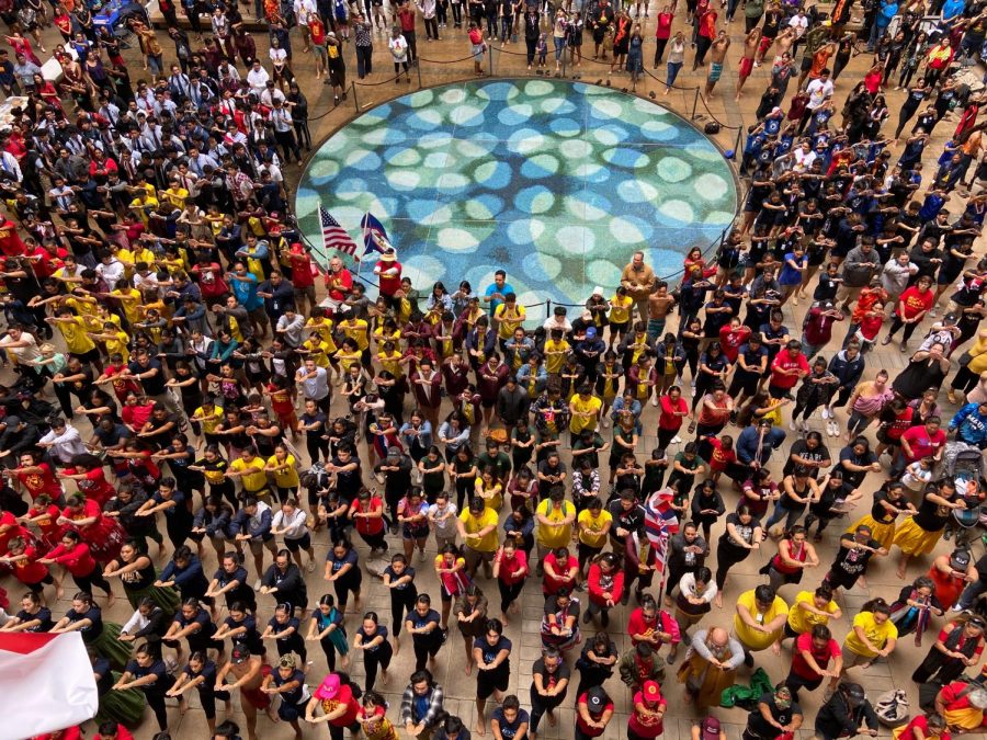 Students and teachers participate in one of the three Aha Ceremonies for the day