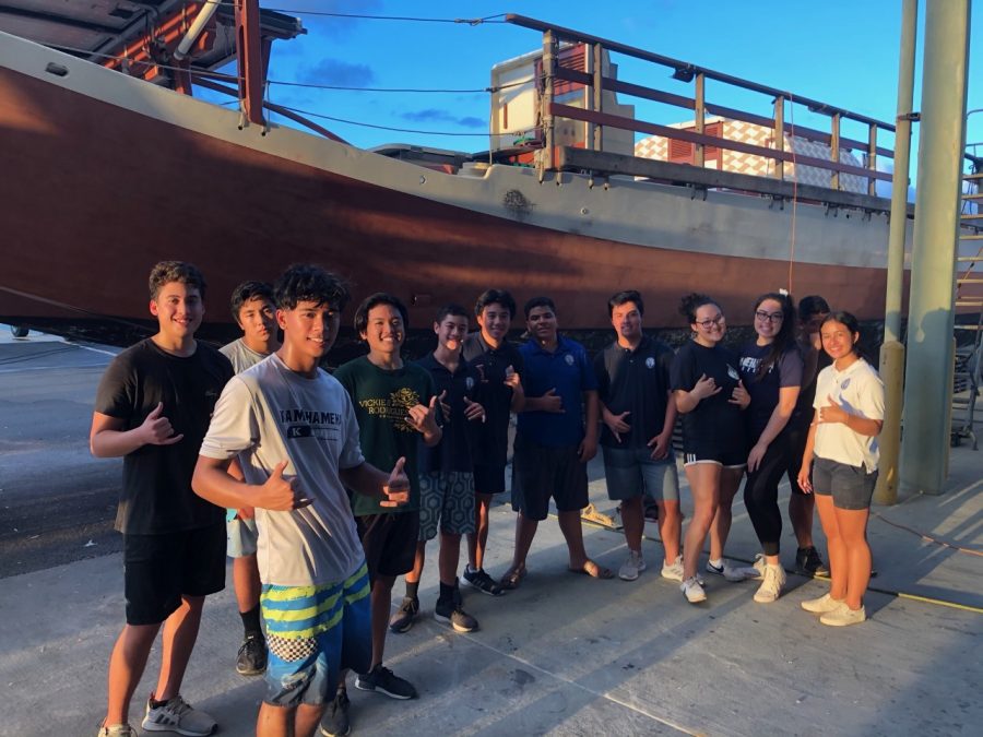 Paddling athletes and managers give back to the Polynesian Voyaging Society.