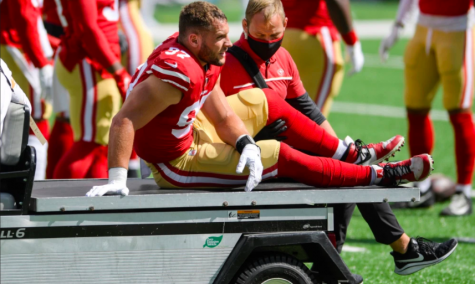 49ers, defensive end, Nick Bosa gets carted off the field after tearing his ACL.