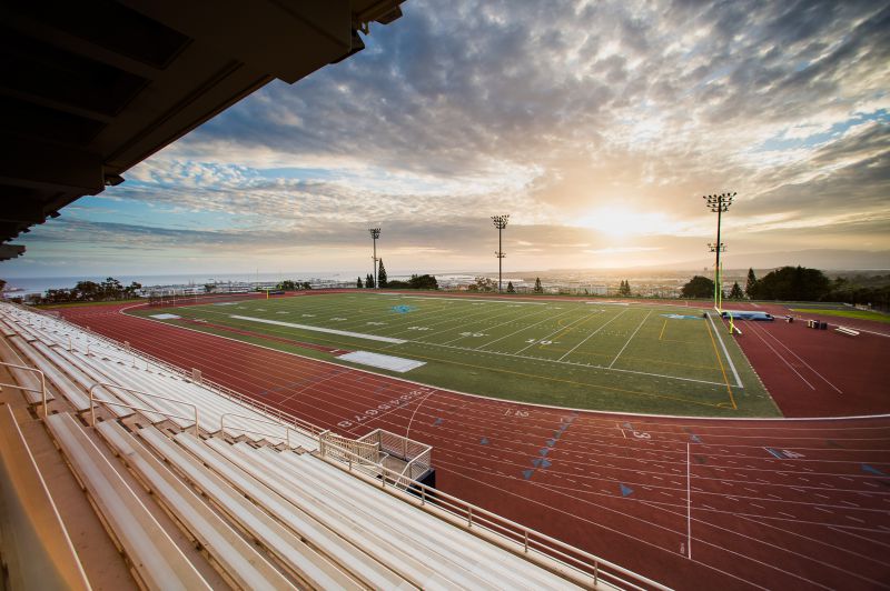 High schoolers participate in frequent running-checkpoints at the KS track.