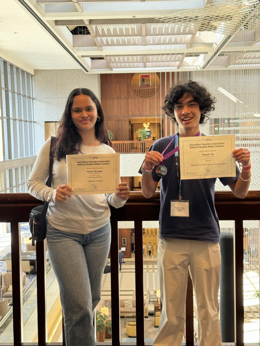 Junior Noah Brooks (left) and senior Kaydn Ito proudly display their national awards earned in the Student Media Contests that was held in Kansas City, Missouri last week.